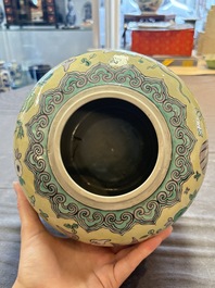 A pair of Chinese verte biscuit 'fish' jars and covers, 19th C.