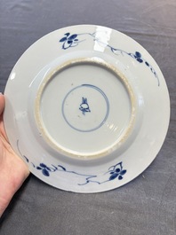 12 Chinese blue and white plates with figural and floral design, 18th C.