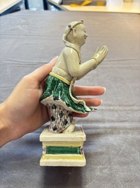 A Chinese sancai-glazed figure of Sudhana, 19th C.