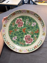 Three Chinese famille rose dishes, two plates and a saucer, various marks, 19th C.
