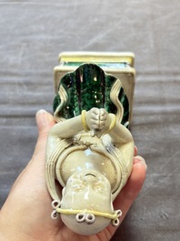 A Chinese sancai-glazed figure of Sudhana, 19th C.
