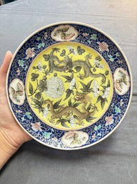 Three Chinese famille rose dishes, two plates and a saucer, various marks, 19th C.