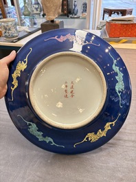 Three Chinese famille rose dishes, two plates and a saucer, various marks, 19th C.