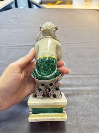 A Chinese sancai-glazed figure of Sudhana, 19th C.