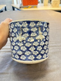 A Chinese Dehua blue and white vase, two containers and a 'prunus on cracked ice' vase, Kangxi mark, 18/19th C.