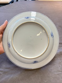 18 Chinese blue and white plates and saucers with floral design, 18th C.