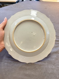 18 Chinese blue and white plates and saucers with floral design, 18th C.