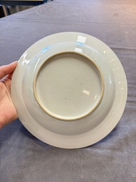 18 Chinese blue and white plates and saucers with floral design, 18th C.