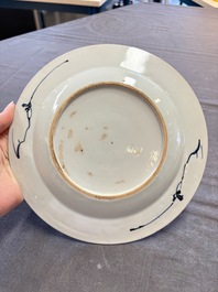 18 Chinese blue and white plates and saucers with floral design, 18th C.