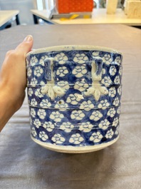 A Chinese Dehua blue and white vase, two containers and a 'prunus on cracked ice' vase, Kangxi mark, 18/19th C.