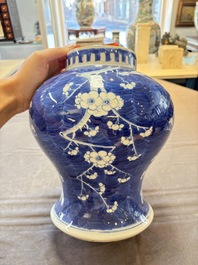A Chinese Dehua blue and white vase, two containers and a 'prunus on cracked ice' vase, Kangxi mark, 18/19th C.