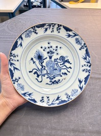 18 Chinese blue and white plates and saucers with floral design, 18th C.