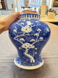 A Chinese Dehua blue and white vase, two containers and a 'prunus on cracked ice' vase, Kangxi mark, 18/19th C.
