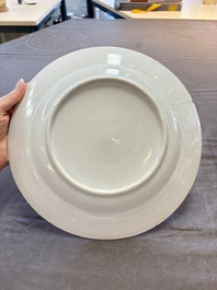 18 Chinese blue and white plates and saucers with floral design, 18th C.