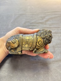 A pair of Chinese bronze Buddhist lions, 19/20th C.