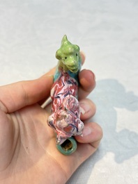 A Chinese famille rose 'Mandarin' group and a 'Qilin' water dropper, Qianlong