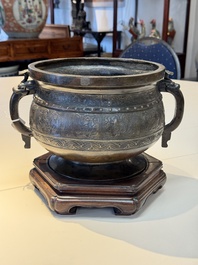 A Chinese archaistic bronze censer with 'Chilong' and 'Lingzhi' handles on wooden stand, Zhou Wang Bo Zuo Bao Ding 周王伯作寶鼎 mark, Yuan/Ming