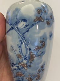 A Chinese blue, white and copper-red 'magpie and prunus' vase, Kangxi mark, 19/20th C.