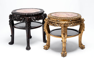 Two Chinese marble-topped hongmu two-tier stands, one with later gilding, 19/20th C.