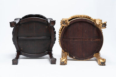 Two Chinese marble-topped hongmu two-tier stands, one with later gilding, 19/20th C.