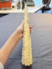 A Chinese ivory carving depicting a Luohan and a dragon, 'Da Ming 大明' mark, 19/20th C.