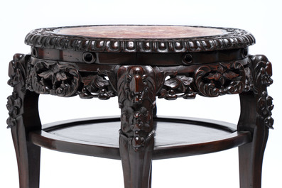 Two Chinese marble-topped hongmu two-tier stands, one with later gilding, 19/20th C.