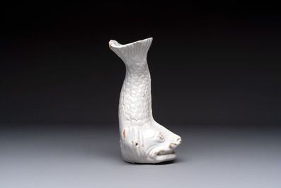 A rare white-glazed Delftware dolphin-shaped fountain, 18th C.
