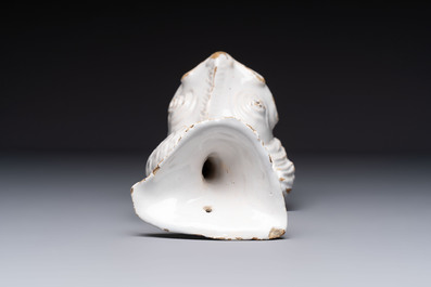 A rare white-glazed Delftware dolphin-shaped fountain, 18th C.