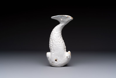 A rare white-glazed Delftware dolphin-shaped fountain, 18th C.