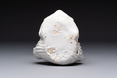 A rare white-glazed Delftware dolphin-shaped fountain, 18th C.