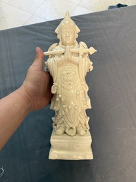 Three Chinese Dehua blanc de Chine figures of Guanyin and Weituo, He Chaozong 何朝宗 and Dehua 德化 marks, 20th C.