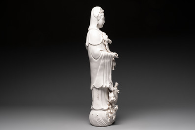 A large Chinese Dehua blanc de Chine standing Guanyin, 20th C.