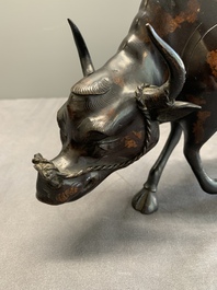 A Japanese gold-splashed bronze incense burner in the shape of an immortal riding a buffalo, ​​Kin San Sō On 金産宗音製造 mark, Meiji, 19th C.