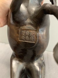 A Japanese gold-splashed bronze incense burner in the shape of an immortal riding a buffalo, ​​Kin San Sō On 金産宗音製造 mark, Meiji, 19th C.