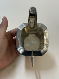 A Chinese silver covered teapot, sugar jar and milk jug with bamboo design, Tackhing 90% silver mark, 20th C.