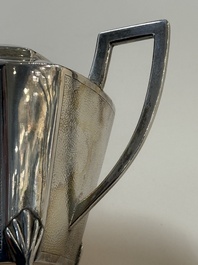 A Chinese silver covered teapot, sugar jar and milk jug with bamboo design, Tackhing 90% silver mark, 20th C.