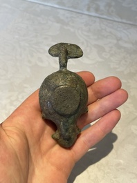 A bronze urn, a bronze canteen with relief design and a pair of bronze oil lamps, Etruscan and Roman civilizations, 9th C. B.C/5th C.