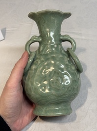 A Chinese Longquan celadon 'shou' vase with handles, Ming