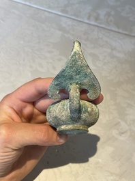 A bronze urn, a bronze canteen with relief design and a pair of bronze oil lamps, Etruscan and Roman civilizations, 9th C. B.C/5th C.