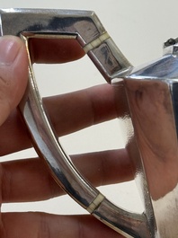 A Chinese silver covered teapot, sugar jar and milk jug with bamboo design, Tackhing 90% silver mark, 20th C.