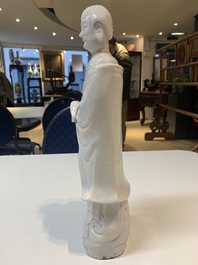 Two Chinese Dehua blanc de Chine wine cups and a figure of Liuhai, 18/19th C.