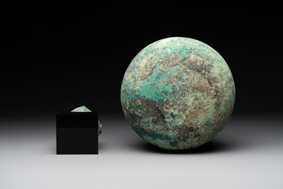 A bronze urn, a bronze canteen with relief design and a pair of bronze oil lamps, Etruscan and Roman civilizations, 9th C. B.C/5th C.