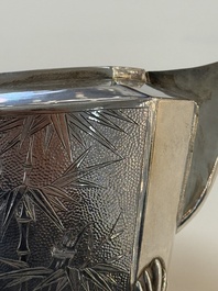 A Chinese silver covered teapot, sugar jar and milk jug with bamboo design, Tackhing 90% silver mark, 20th C.