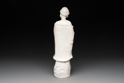 Two Chinese Dehua blanc de Chine wine cups and a figure of Liuhai, 18/19th C.