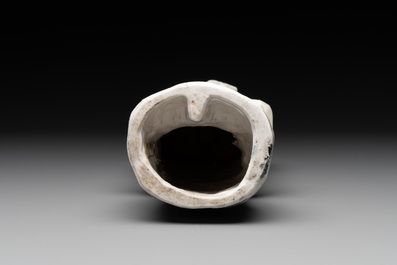 Two Chinese Dehua blanc de Chine wine cups and a figure of Liuhai, 18/19th C.