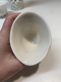 Two Chinese Dehua blanc de Chine wine cups and a figure of Liuhai, 18/19th C.