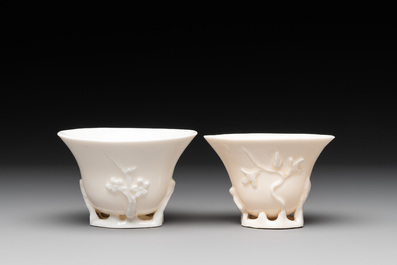 Two Chinese Dehua blanc de Chine wine cups and a figure of Liuhai, 18/19th C.