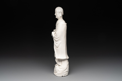 Two Chinese Dehua blanc de Chine wine cups and a figure of Liuhai, 18/19th C.