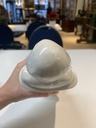 Two Chinese Dehua blanc de Chine wine cups and a figure of Liuhai, 18/19th C.