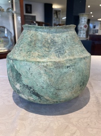 A bronze urn, a bronze canteen with relief design and a pair of bronze oil lamps, Etruscan and Roman civilizations, 9th C. B.C/5th C.